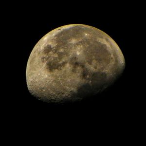 Close-up of moon over black background