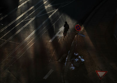 High angle view of person walking on floor