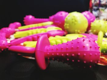 Close-up of multi colored candies on table