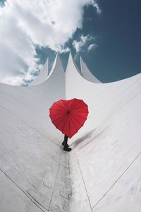 Low angle view of umbrella against sky