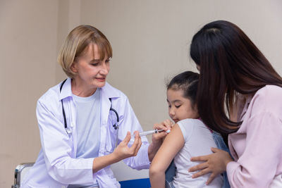 Mother and daughter at clinic