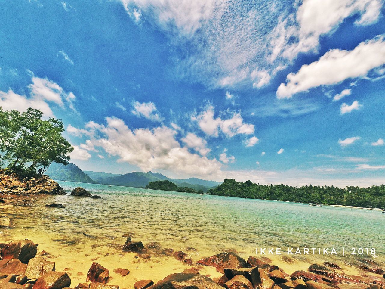 cloud - sky, sky, scenics, beauty in nature, tranquility, nature, water, tranquil scene, sea, no people, outdoors, day, beach, mountain, blue, landscape, tree