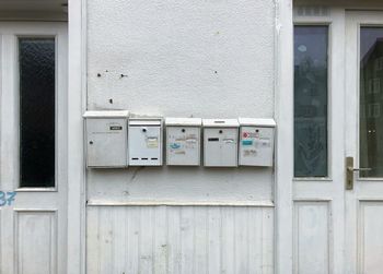 Close-up of mailbox on building wall