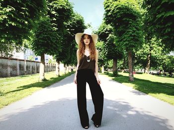 Woman standing on grass