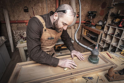 Man working on wood