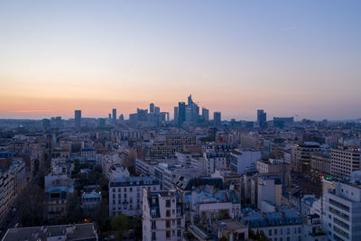 High angle view of buildings against sky during sunset