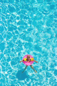 High angle view of person swimming in pool