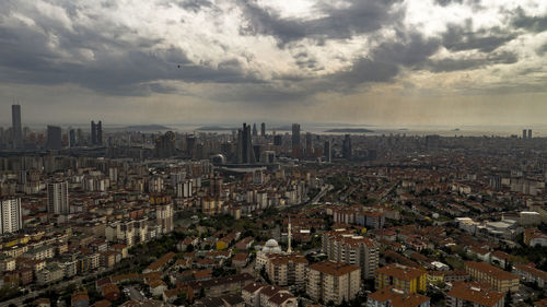 High angle view of buildings against sky in city