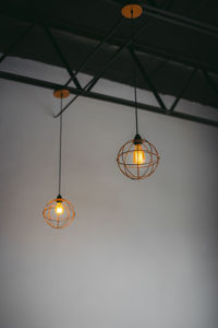 Low angle view of illuminated chandelier