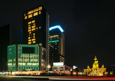 Illuminated buildings at night