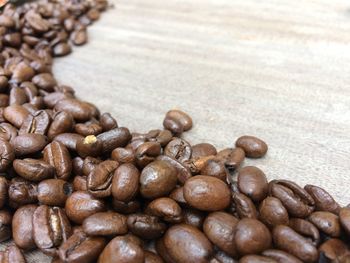 Close-up of coffee beans on table