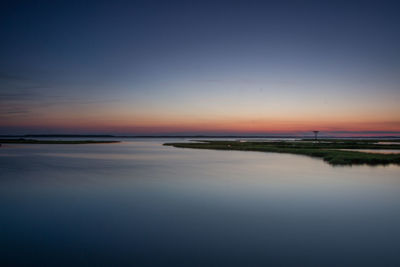 Scenic view of sea at sunset