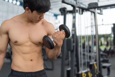 Man exercising in gym