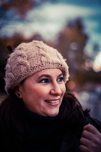 Portrait of a smiling young woman in winter