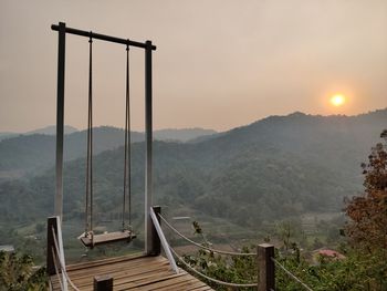 Scenic view of mountains against sky during sunset