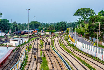 Train on railroad tracks against clear sky