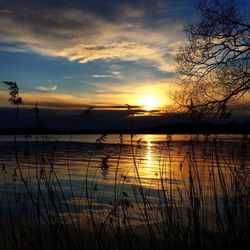 Scenic view of sunset over sea