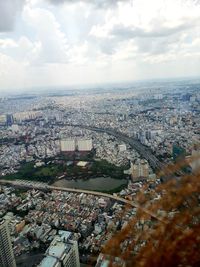 High angle view of buildings against sky in city