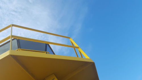 Low angle view of built structure against blue sky