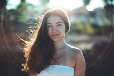 Portrait of smiling young woman