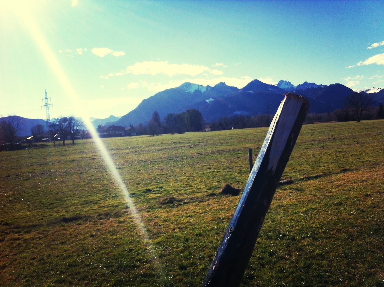 mountain, landscape, grass, sunbeam, sky, sun, tranquility, tranquil scene, sunlight, mountain range, lens flare, scenics, field, beauty in nature, nature, grassy, non-urban scene, green color, cloud - sky, remote