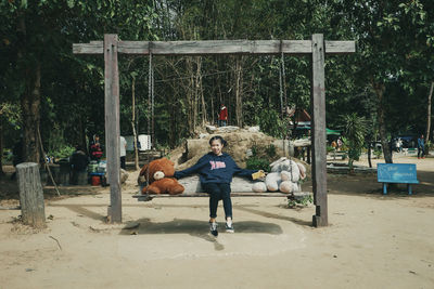 Full length of woman playing soccer