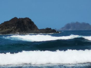 Scenic view of sea against clear sky