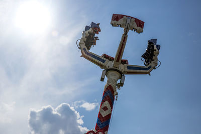 Low angle view of street light against sky