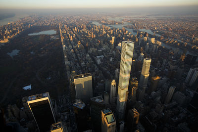 Sunset over highrise apartments near central park, new york city.