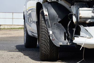 Close-up of tire tracks in road