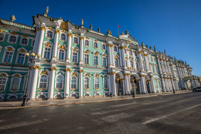 Low angle view of building against blue sky