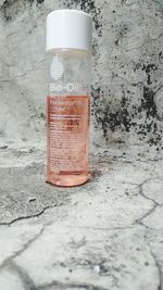 Close-up of drink in jar on wall