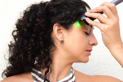 Close-up portrait of young woman