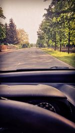 Road seen through car windshield