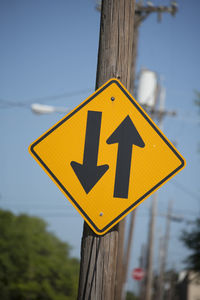 Close up of a two-way traffic sign on a utility pole