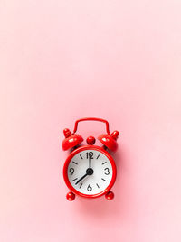 Close-up of clock on wall