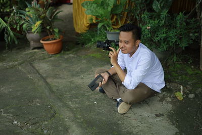 Young man looking at camera