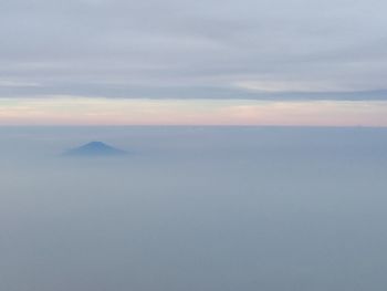 Scenic view of mountains against sky during sunset