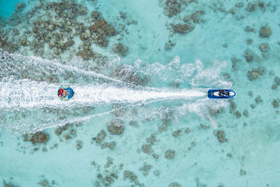 Water sports in maldives over corals