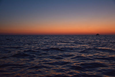 Scenic view of sea at sunset