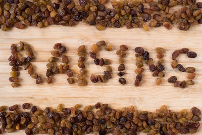 Directly above shot of raisins on cutting board
