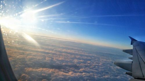 Aerial view of cloudscape seen from airplane window