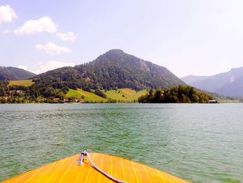 Scenic view of lake with mountains in background