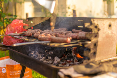 Close-up of meat on barbecue grill