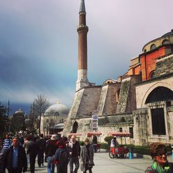 Tourists in front of historic building