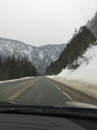 Road seen through car windshield