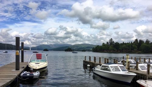 Boats moored at harbor