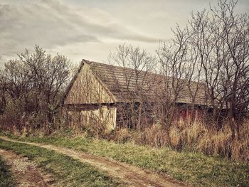 House on field against sky