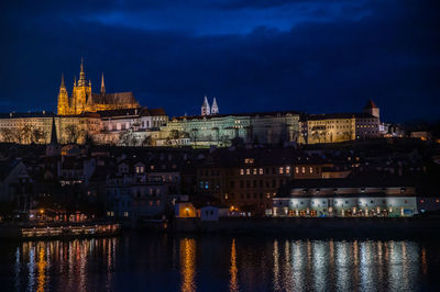 Illuminated buildings at waterfront