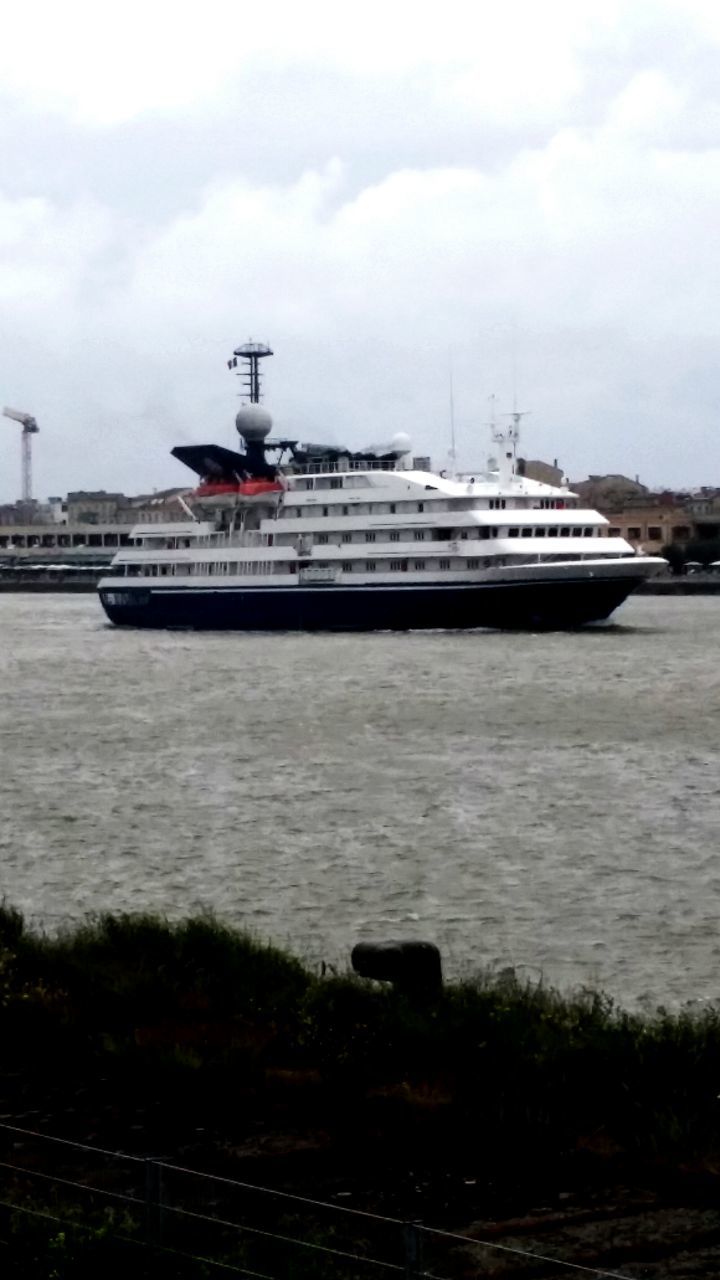 water, sky, building exterior, built structure, architecture, nautical vessel, cloud - sky, sea, transportation, boat, cloudy, river, moored, mode of transport, harbor, nature, lake, day, cloud, outdoors